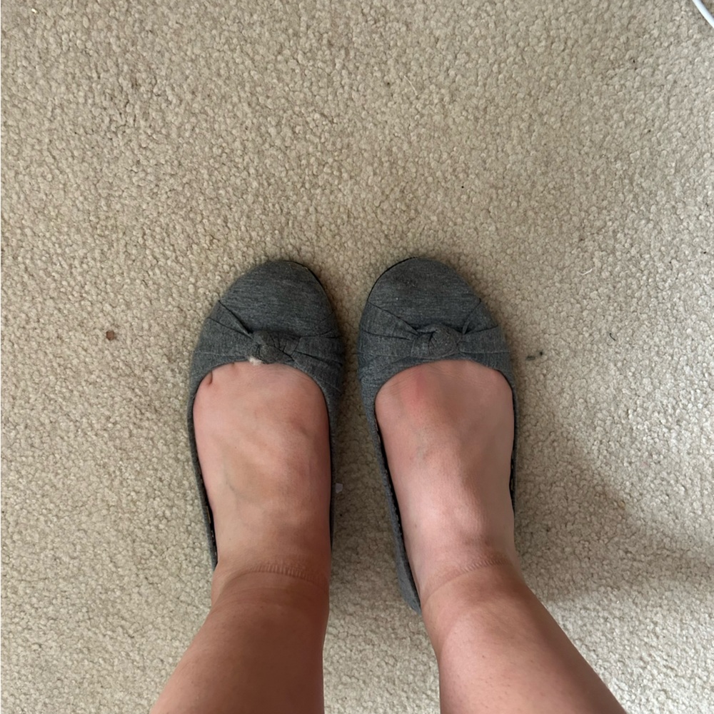 Very worn women’s flats